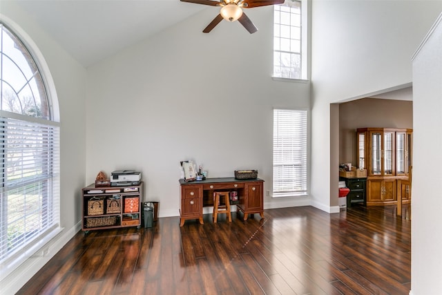 office with high vaulted ceiling, ceiling fan, and dark hardwood / wood-style flooring