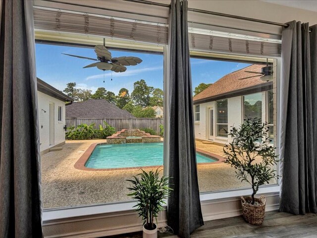 view of pool featuring a ceiling fan