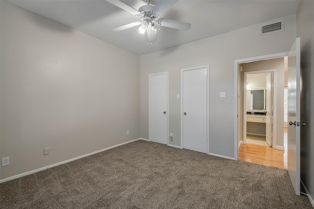 unfurnished bedroom with carpet flooring and ceiling fan