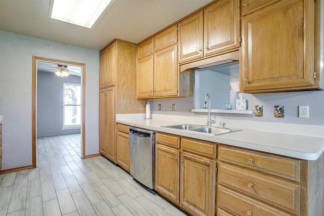 kitchen with dishwasher, light wood-type flooring, ceiling fan, and sink