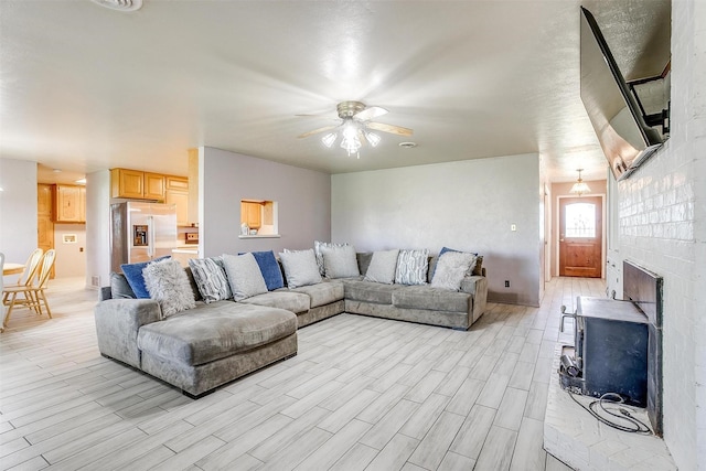 living room featuring ceiling fan