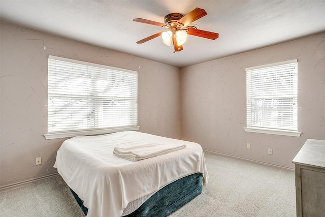 bedroom with carpet flooring and ceiling fan