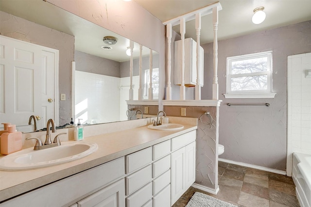 full bathroom with vanity, shower / bath combination, and toilet