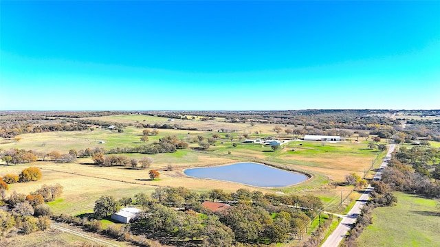 bird's eye view featuring a rural view and a water view