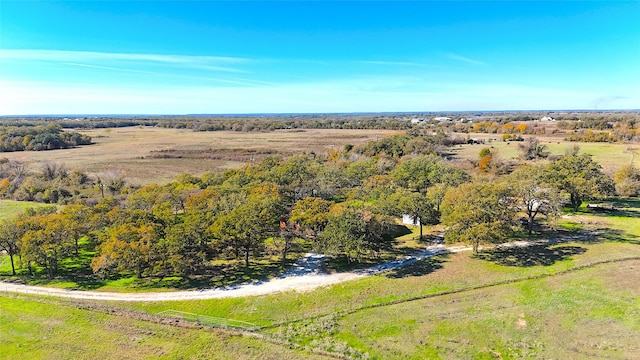 birds eye view of property featuring a rural view