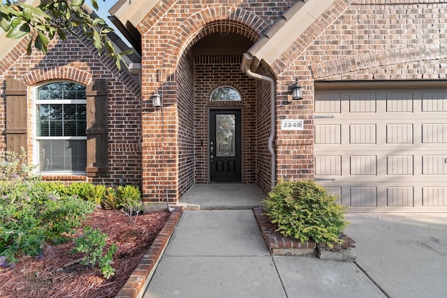 entrance to property with a garage