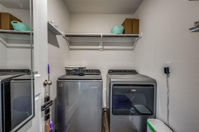 laundry area with separate washer and dryer