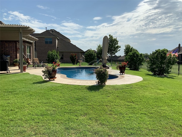 view of pool featuring a yard, a patio area, and a pergola