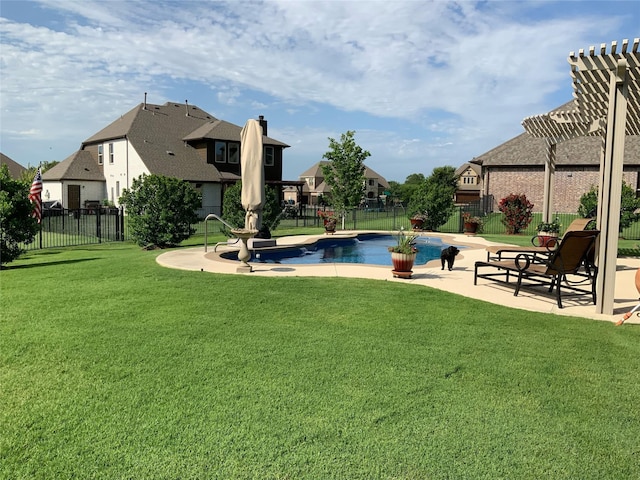 view of pool featuring a patio area and a lawn