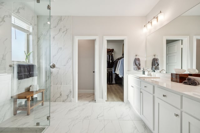 bathroom with vanity and walk in shower