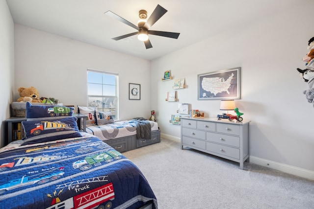 carpeted bedroom featuring ceiling fan