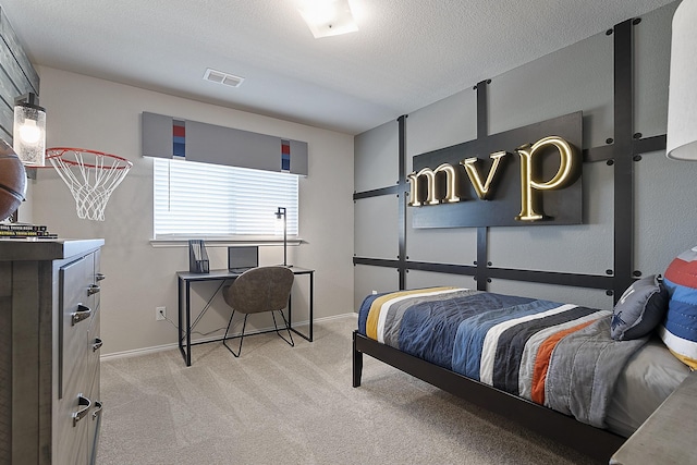 carpeted bedroom with a textured ceiling