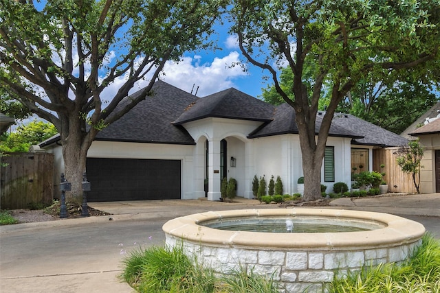 view of front of property featuring a garage