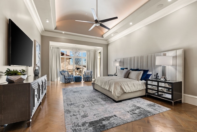 bedroom with a raised ceiling, crown molding, dark parquet floors, and ceiling fan