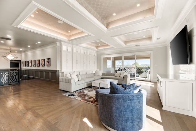 living room with ornamental molding, coffered ceiling, and beam ceiling