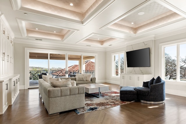 living room with coffered ceiling, crown molding, dark wood-type flooring, and a wealth of natural light