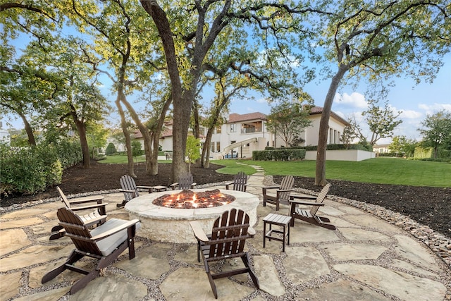 view of patio / terrace featuring a fire pit