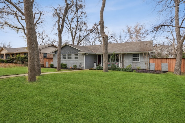 ranch-style house with a front yard