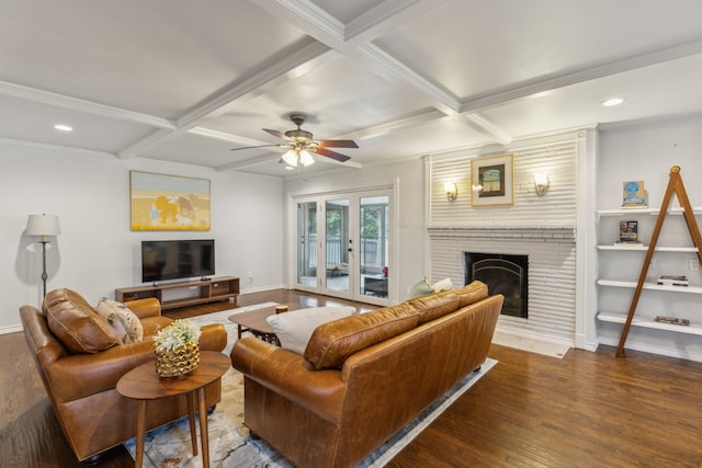 living room featuring beam ceiling, dark hardwood / wood-style flooring, and coffered ceiling