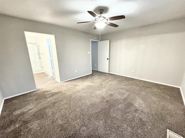 unfurnished room featuring carpet floors and ceiling fan