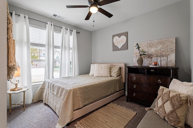 carpeted bedroom featuring ceiling fan