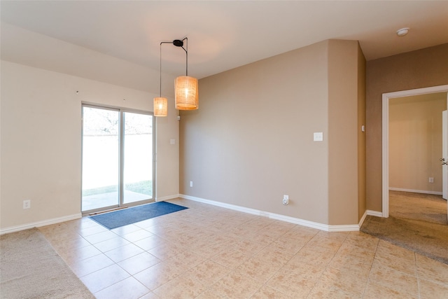 view of tiled spare room