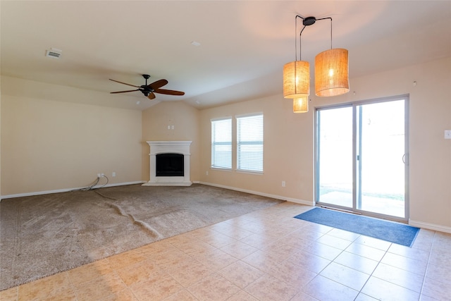 unfurnished living room with ceiling fan, light tile patterned flooring, lofted ceiling, and a wealth of natural light