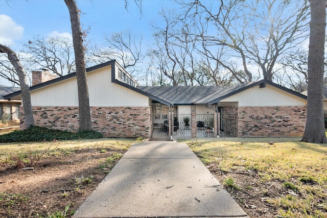 view of front of home with a front yard