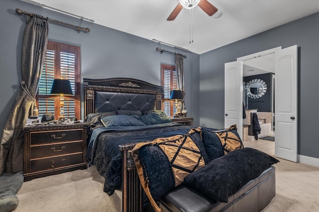 bedroom featuring ceiling fan and light carpet