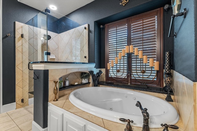 bathroom with tile patterned flooring and plus walk in shower