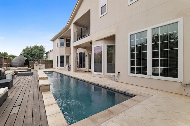 view of swimming pool with a patio area