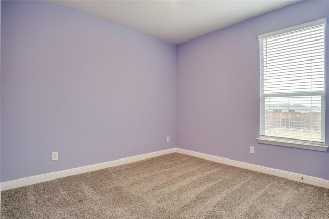 view of carpeted spare room