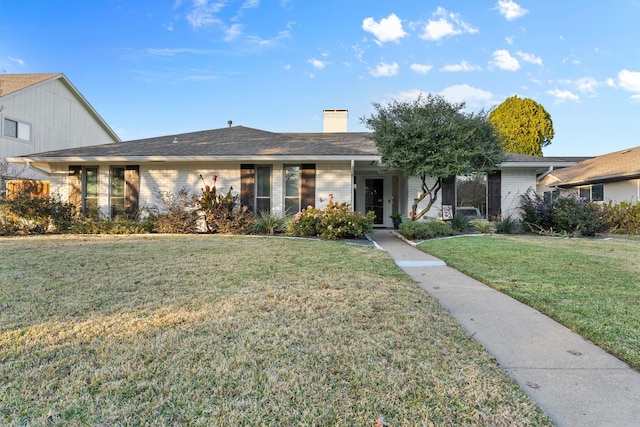 ranch-style house with a front yard