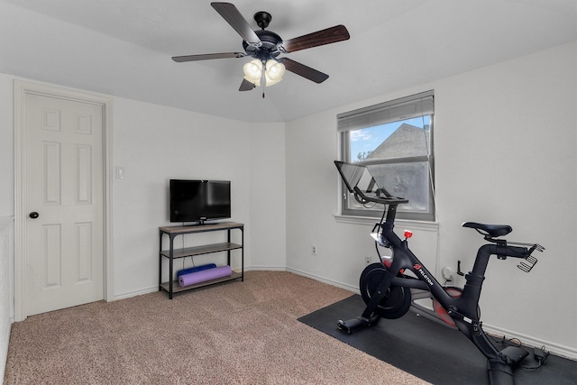 workout room featuring carpet flooring and ceiling fan