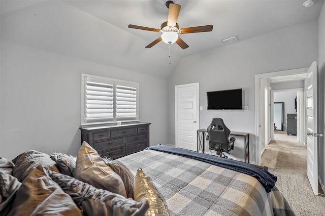 bedroom featuring lofted ceiling, light colored carpet, and ceiling fan