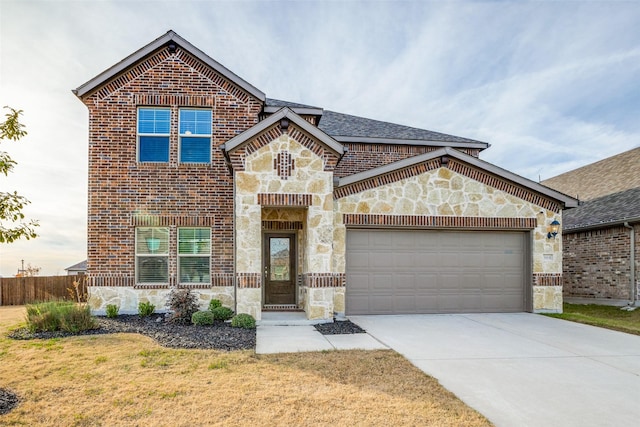 front of property with a garage and a front yard