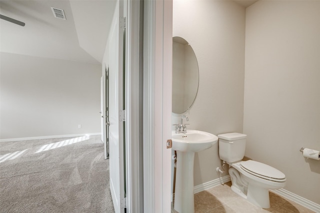 bathroom with toilet and sink