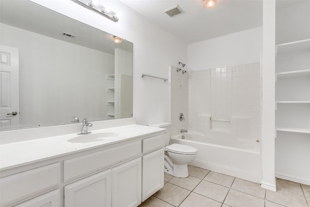 full bathroom featuring toilet, vanity, tile patterned floors, and tub / shower combination