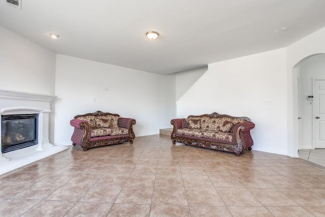 sitting room with light tile patterned flooring