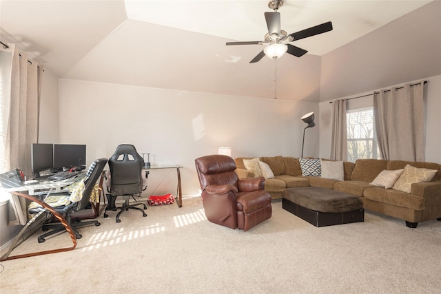 living room featuring ceiling fan, lofted ceiling, and light carpet