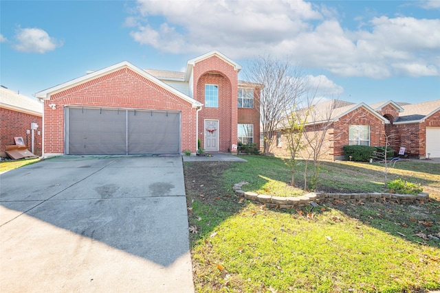 view of front of house featuring a garage and a front yard