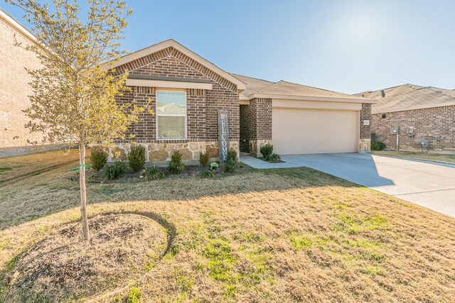 ranch-style home with a garage and a front yard