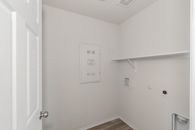 laundry room featuring hookup for a washing machine, wood-type flooring, electric dryer hookup, and gas dryer hookup