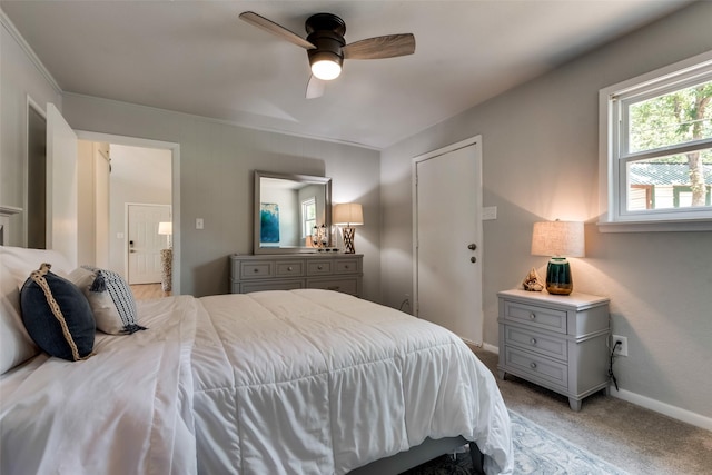 bedroom with light carpet and ceiling fan