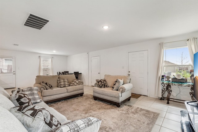 living room with light tile patterned floors