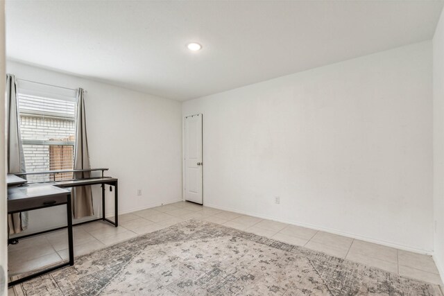 view of tiled spare room