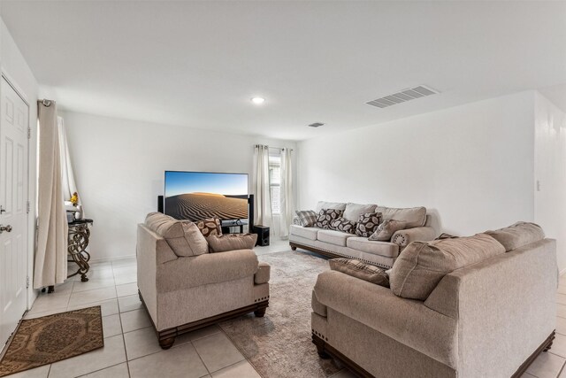 living room with light tile patterned floors