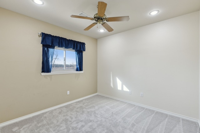 carpeted empty room with ceiling fan