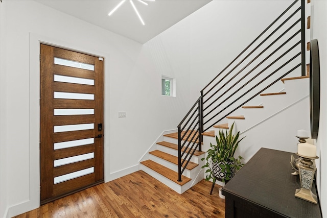 foyer with hardwood / wood-style floors