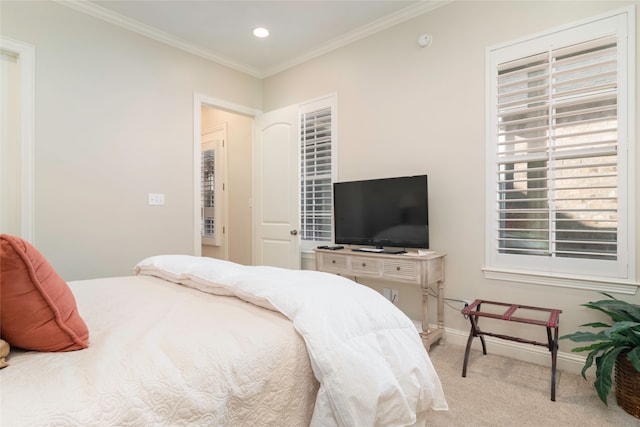 carpeted bedroom with crown molding